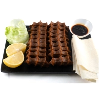 70 stuks çiğköfte, 8 lavas brood, 2 porties groenten , 2 porties granaatappelsaus en 2 porties pittige Hanzade saus